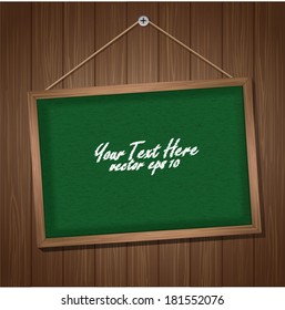 Blackboard on wooden background. Vector illustration. 