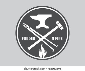 Blacksmith vector emblem or badge.
Retro style blacksmith design with forging tools including hammers, anvil, tongs and fire.