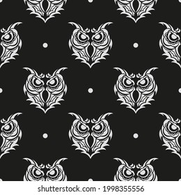 Black-white Seamless pattern owl face in boho style. Good for clothing and textiles. Vector
