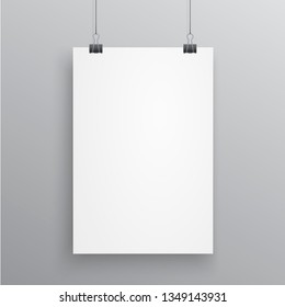 Blank A4 page hanged with paper clips on white background.