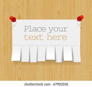 Blank advertisement with cut slips on wooden background