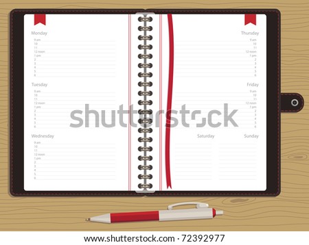 blank appointment book with week days and pen on wood background