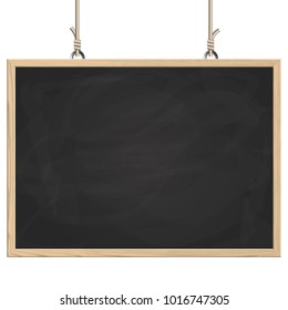 blank black board with wooden frame hanging on ropes