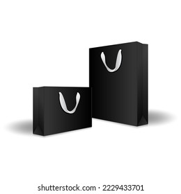 Blank black paper shopping bags or gift bags with ribbon handles mockup template. Isolated on white background with shadow. Ready to use for branding design. Realistic vector illustration.