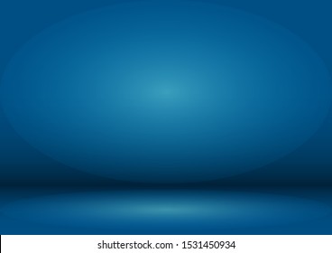 Blank blue Studio background with vignette. The blue background is illuminated by a light source.