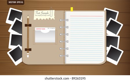 blank brown notebook with photo frame on wooden background. Vector template for design work