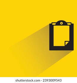 blank clipboard icon with shadow on yellow background