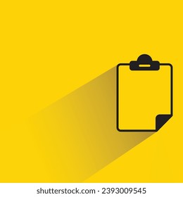 blank clipboard icon with shadow on yellow background