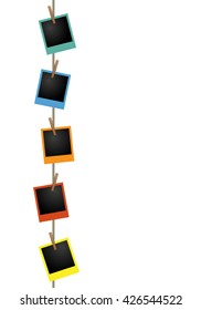 Blank colorful photo frames on a clothesline