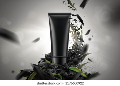 Blank cosmetic plastic tube in 3d illustration with crushed carbons and leaves on bokeh background