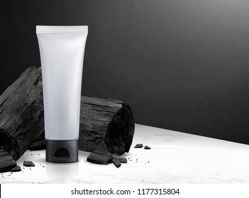 Blank Cosmetic Plastic Tube With Charcoal In 3d Illustration On Marble Stone Table Texture And Black Wall