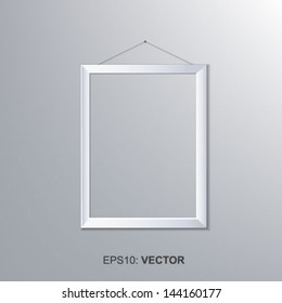 blank frame on gray wall