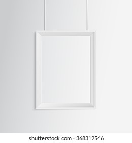 Blank frame on white wall.