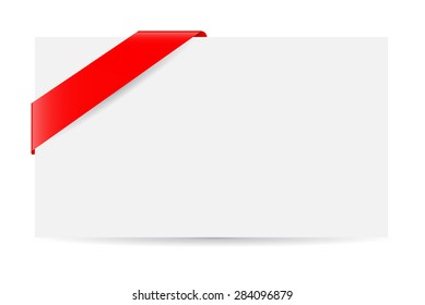 blank greeting card and golden red ribbon
