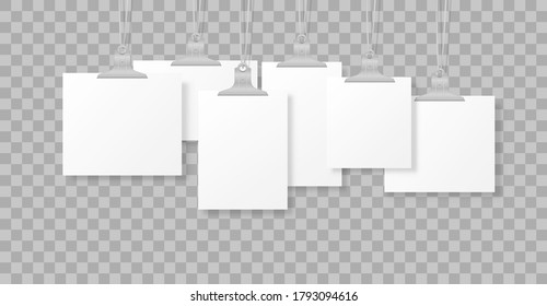 Blank hanging photo frames or poster templates isolated on transparent background. A set of white poster mockups hanging on binder on the wall. Frame for a sheet of paper. Vector illustration.