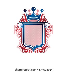Blank heraldic design with copy space and cartouche, vector vintage protection shield emblem decorated with royal crown and rolled-up ends.