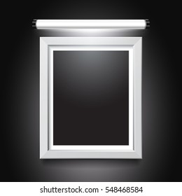 Blank illuminated picture frame on black background. Vector template for your presentations.