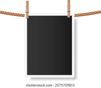 Blank instant photo featuring a white frame, hanging on a clothesline with clothespins, isolated against a white background, casting a soft shadow for a clean, minimal look