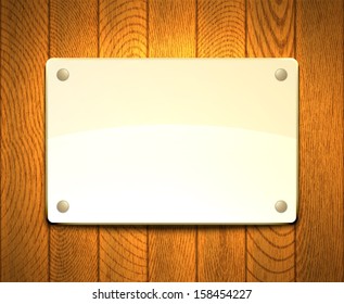 Blank light framework hanging on a wooden wall. EPS10 vector.