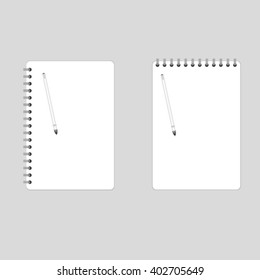 Blank note paper with pen. isolated on white.