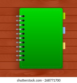 Blank notebook cover template on wood background. Vector illustration for your design.