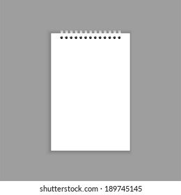 Blank notebook isolated on gray.