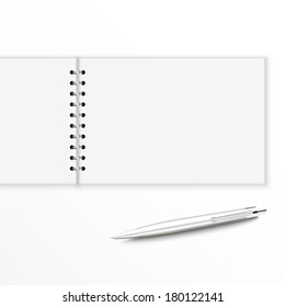 Blank notebook with pen. isolated on white. 