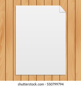 Blank paper on a light wood texture background