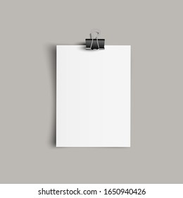 Blank paper sheet with paper clip and shadow on transparent background.