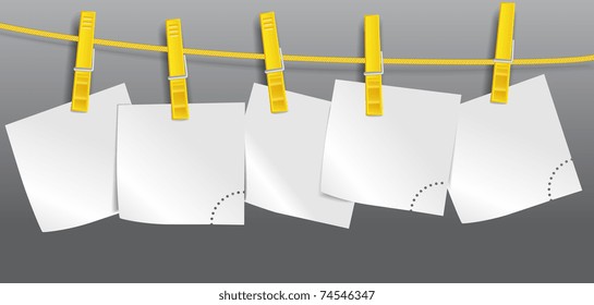 Blank paper sheets on rope