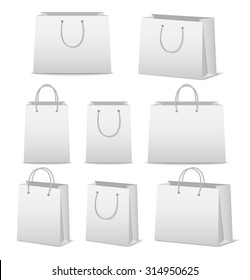 Blank paper shopping bags set isolated on white. Vector EPS10 illustration. 