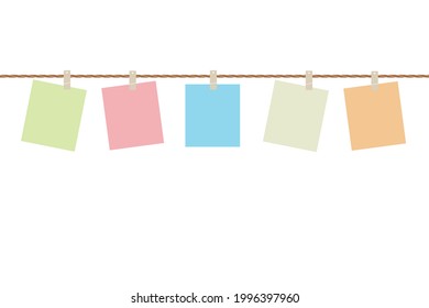 Blank papers colorful hanging on rope isolated on white background with copy space