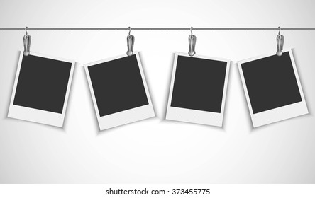 Blank Photo Frame Hanging On A Wire Rope With Metallic Clip