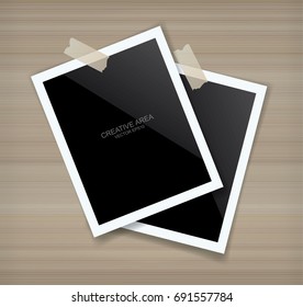Blank photo frame or picture frame stick on wood wall. Vector vintage background.
