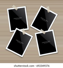 Blank photo frame or picture frame stick on wood wall. Vector grunge vintage background.