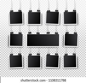 Blank photo frame set hanging on a clip. Retro vintage style. Black empty place for your text or photo. Realistic detailed photo icon design template. Vector solated on transparent background.