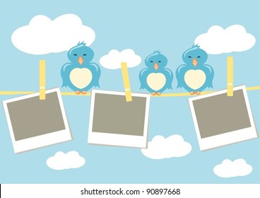 blank photo frames hanging on clothesline birds standing on