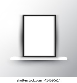 Blank picture frame on a shelf