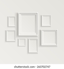 Blank picture frame template set isolated on wall