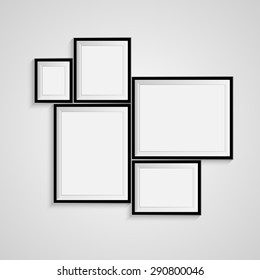 Blank picture frame template set isolated on wall