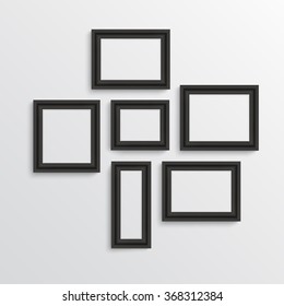 Blank picture frame template set isolated on wall