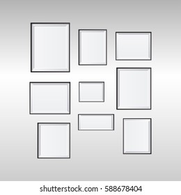 blank picture frame template set isolated on wall