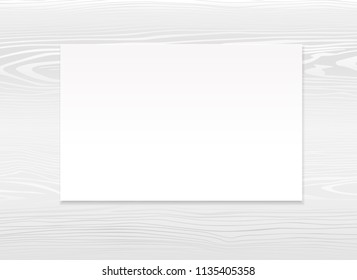 Blank postcard template. Vector mockup design of empty white post card on light gray wooden background. Make your own idea to print