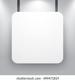 Blank poster on a wall with light and shadow