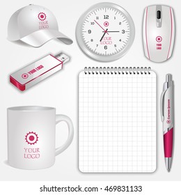 Blank realistic spiral notebook, clock, pen, cup, computer mouse, flash drive and baseball cap isolated on white vector. Display Mock up for corporate identity and promotion objects