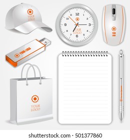 Blank realistic spiral notebook, clock, shopping bag, white pen, computer mouse, flash drive and baseball cap isolated on white vector. Display Mock up for corporate identity and promotion objects