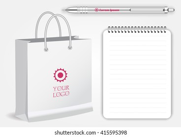 Blank realistic spiral notepad notebook, white pen and  shopping bag isolated on white vector. Display Mock up for corporate identity and promotion objects