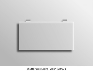 Blank rectangle sign secured by metal hooks hangs on a clean white wall, casting soft shadows. Minimal design concepts, advertising backgrounds, or interior decor