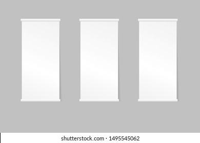 Blank roll up banner stand. Empty mockup.isolated on grey background.three banners