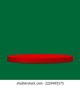 blank round pedestal. red podium on green background  with copy space for festive graphic design element
